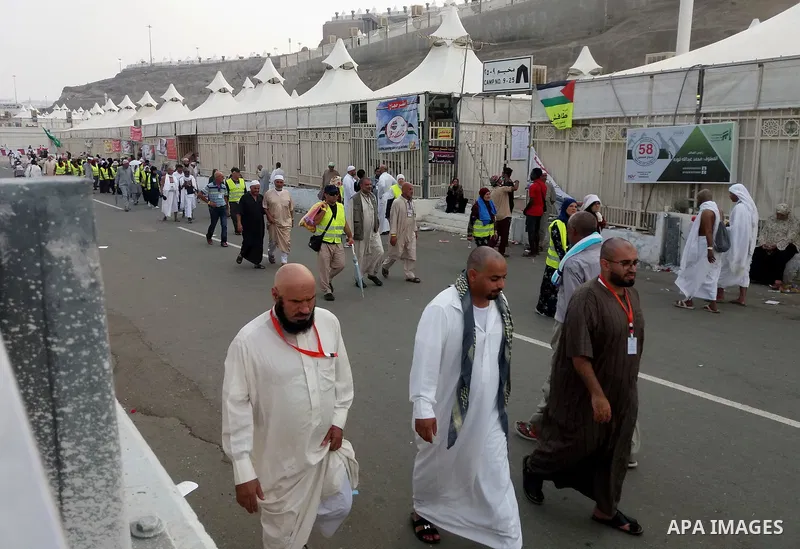 Muslim pilgrims make their way to cast stones at a pillar, symbolizing the stoning of Satan, in a ritual called "Jamarat," during the annual hajj pilgrimage, in Mena, near the holy city of Mecca on Septemper 2, 2017. Pho...