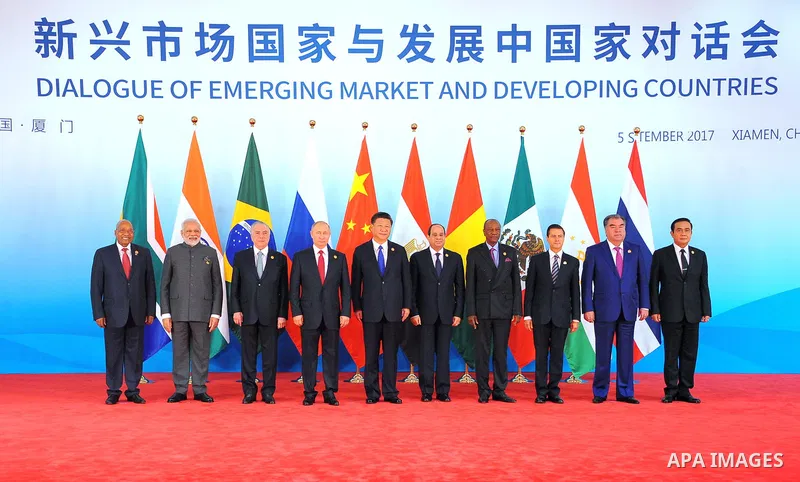 Chinese President Xi Jinping (5th L), Brazilian President Michel Temer (3rd L), Russian President Vladimir Putin (4th L), Indian Prime Minister Narendra Modi (2nd L), South African President Jacob Zuma (1st L), Egyptian...