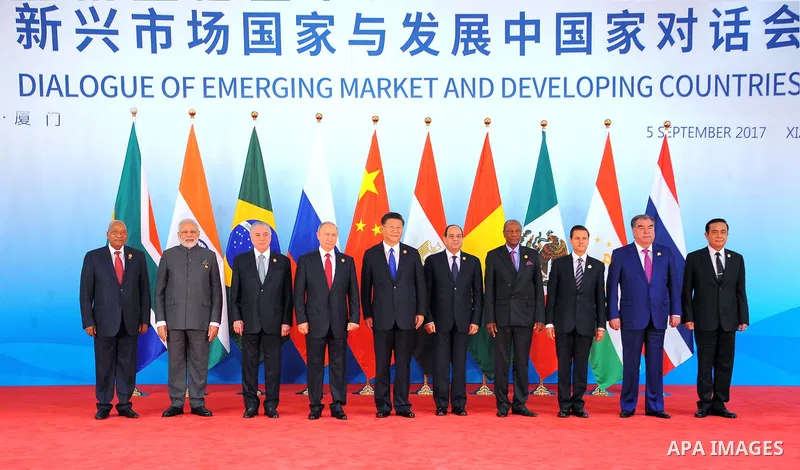 Chinese President Xi Jinping (5th L), Brazilian President Michel Temer (3rd L), Russian President Vladimir Putin (4th L), Indian Prime Minister Narendra Modi (2nd L), South African President Jacob Zuma (1st L), Egyptian...