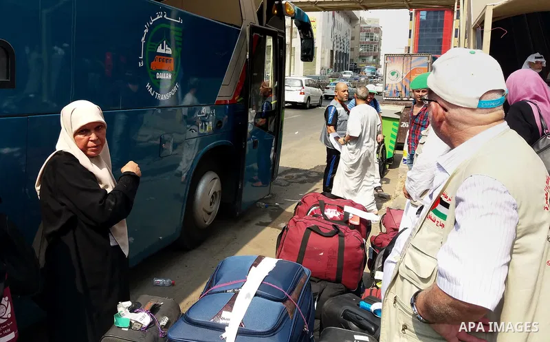 Muslim pilgrims load their bags after perform the annual hajj pilgrimage in the holy city of Mecca on Sept. 6, 2017. According to the Muslims holy book the Koran, the Kaaba was built by Abraham and his son Ismael, after...