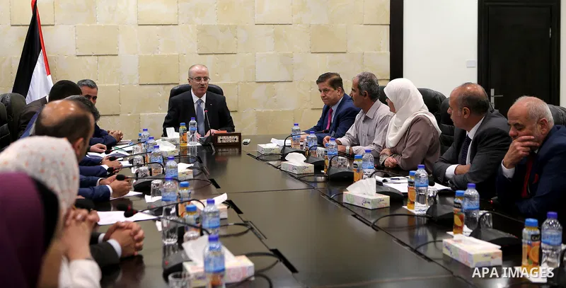 Palestinian Prime Minister, Rami Hamdallah chairs a meeting, in the West Bank city of Ramallah, on Sept. 6, 2017. Photo by Prime Minister Office