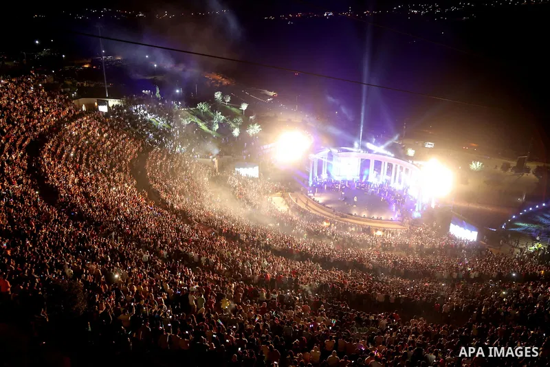 Palestinians attend a concert by Palestinian singer Mohammed Assaf Winner of Arab Idol 2013 in the West Bank city of Rawabi on Septemper 8, 2017. Photo by Shadi Hatem