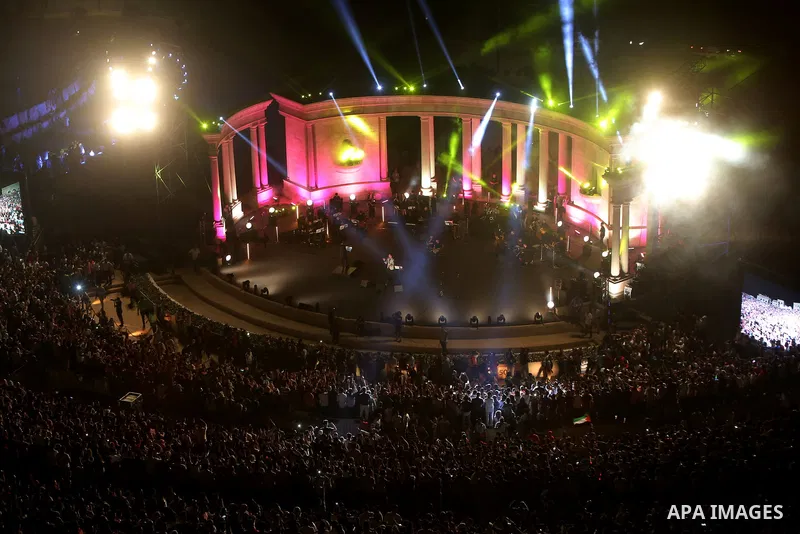 Palestinians attend a concert by Palestinian singer Mohammed Assaf Winner of Arab Idol 2013 in the West Bank city of Rawabi on Septemper 8, 2017. Photo by Shadi Hatem