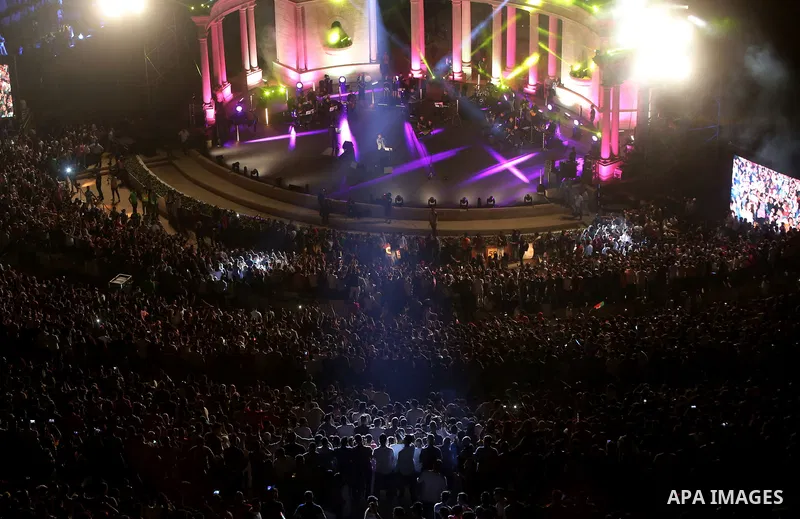 Palestinians attend a concert by Palestinian singer Mohammed Assaf Winner of Arab Idol 2013 in the West Bank city of Rawabi on Septemper 8, 2017. Photo by Shadi Hatem