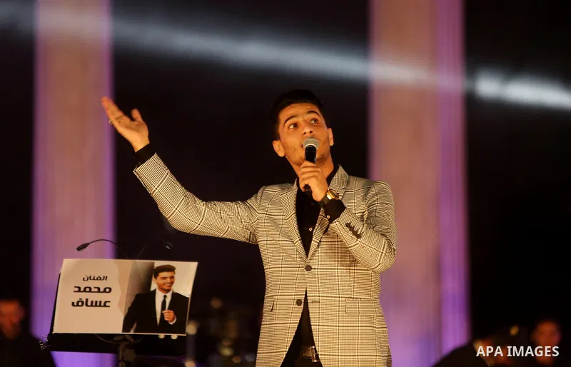 Palestinian singer Mohammed Assaf Winner of Arab Idol 2013 performs during a concert in the West Bank city of Rawabi on Septemper 8, 2017. Photo by Shadi Hatem