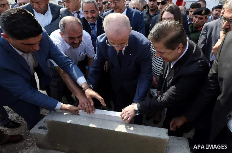 Palestinian Prime Minister, Rami Hamdallah, Lays the foundation stone of the Tulkarm Health Directorate building, in the West Bank city of Tulkarm, on September 9, 2017. Photo by Prime Minister Office