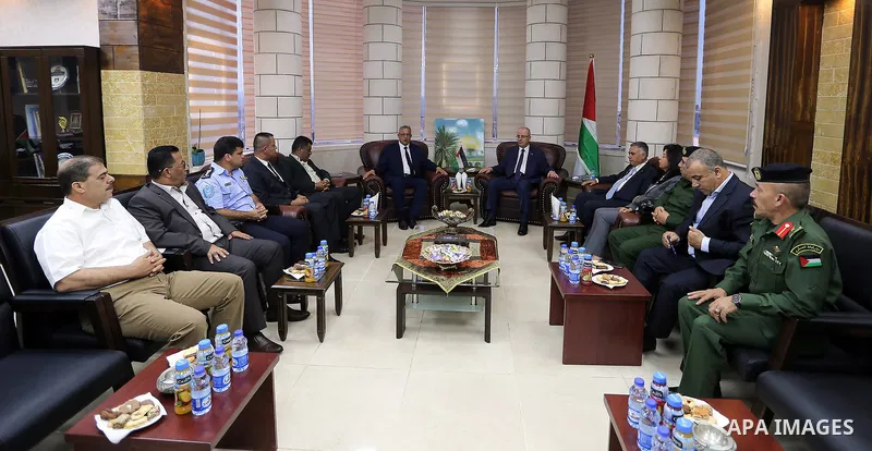Palestinian Prime Minister, Rami Hamdallah chairs a metting with security chiefs in the West Bank city of Tulkarm, on September 9, 2017. Photo by Prime Minister Office