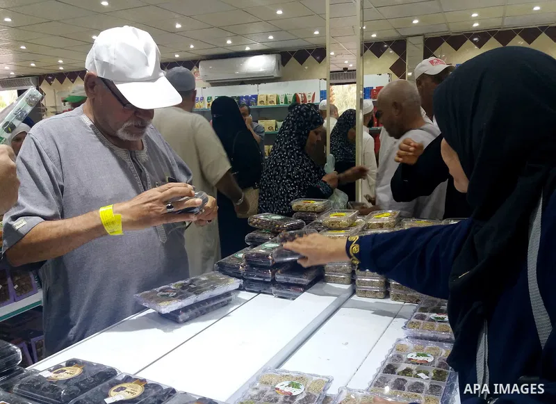 Muslim pilgrims visit House of dates "Beit al-Tomor" after their duty of pilgrimage in Medina, Saudi Arabia on September 9, 2017. Photo by Mohammed Hassan