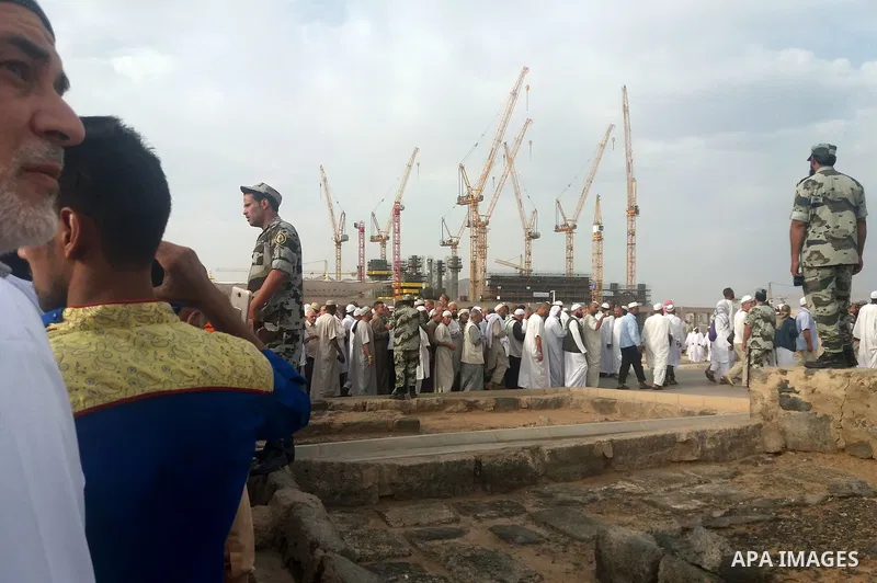 Muslim pilgrims visit Al-Baqi, the main cemetery for people are buried since the era of the Prophet Mohammad's family, relatives and companions, behind the Al-Masjid al-Nabawi, (the Mosque of the Prophet), after their du...