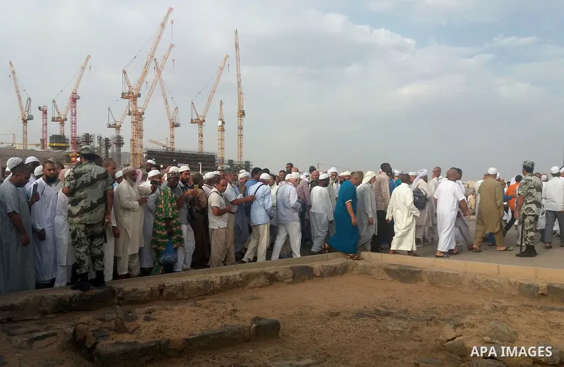 Muslim pilgrims visit Al-Baqi, the main cemetery for people are buried since the era of the Prophet Mohammad's family, relatives and companions, behind the Al-Masjid al-Nabawi, (the Mosque of the Prophet), after their du...