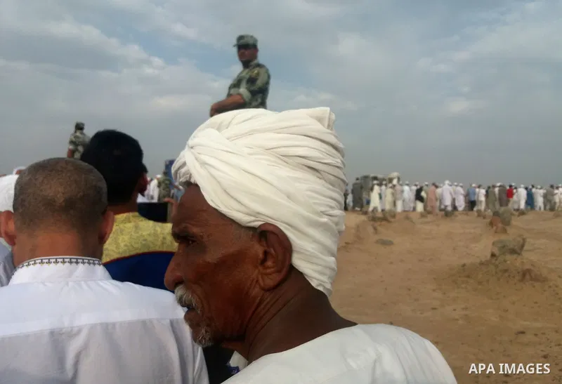 Muslim pilgrims visit Al-Baqi, the main cemetery for people are buried since the era of the Prophet Mohammad's family, relatives and companions, behind the Al-Masjid al-Nabawi, (the Mosque of the Prophet), after their du...