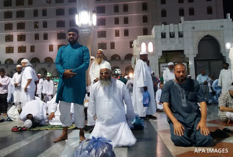 Muslims pilgrims visit the tomb of Prophet Mohammad at Al-Masjid al-Nabawi (The Mosque of the Prophet) after their duty of pilgrimage in the holy city of Medina, Saudi Arabia Sept. 11, 2017. Photo by Mohammed Hassan