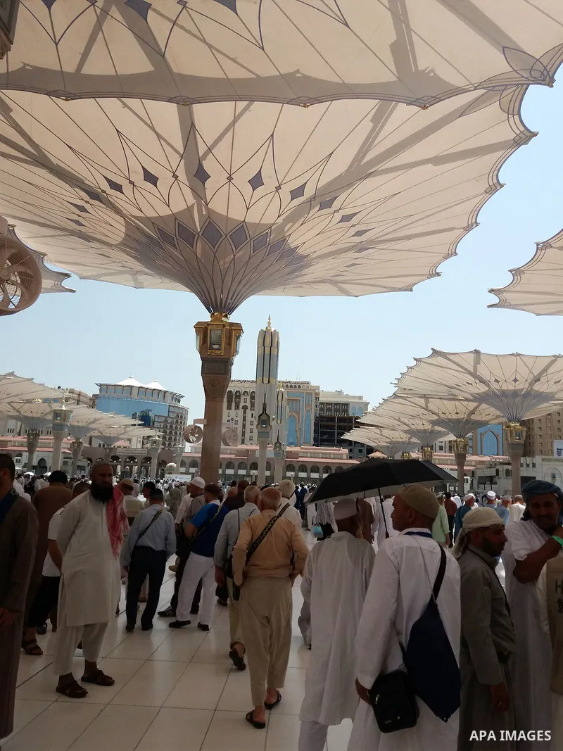 Muslims pilgrims visit the tomb of Prophet Mohammad at Al-Masjid al-Nabawi (The Mosque of the Prophet) after their duty of pilgrimage in the holy city of Medina, Saudi Arabia Sept. 11, 2017. Photo by Mohammed Hassan
