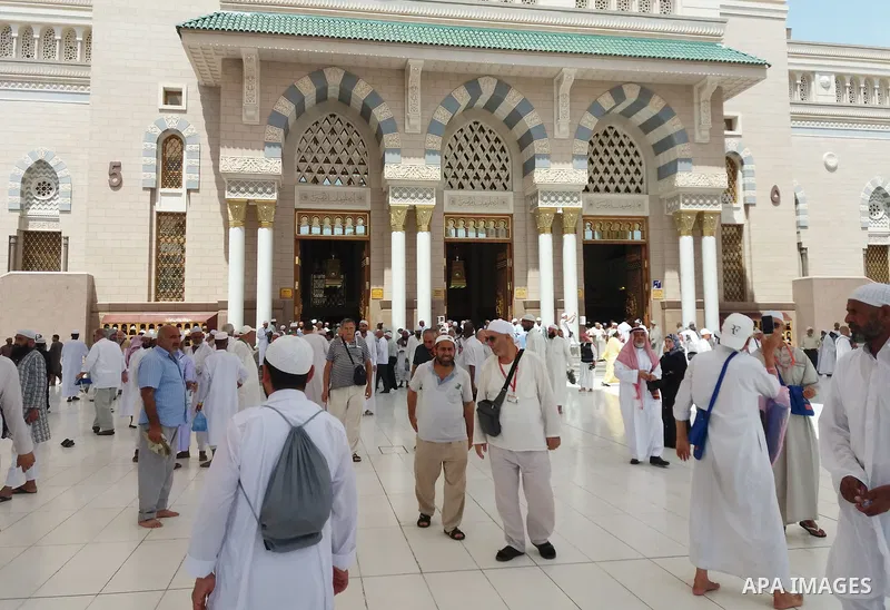 Muslims pilgrims visit the tomb of Prophet Mohammad at Al-Masjid al-Nabawi (The Mosque of the Prophet) after their duty of pilgrimage in the holy city of Medina, Saudi Arabia Sept. 11, 2017. Photo by Mohammed Hassan