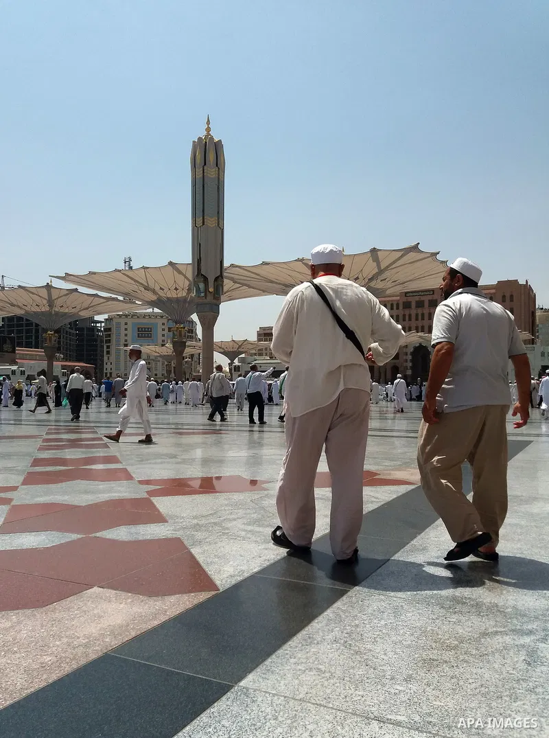 Muslims pilgrims visit the tomb of Prophet Mohammad at Al-Masjid al-Nabawi (The Mosque of the Prophet) after their duty of pilgrimage in the holy city of Medina, Saudi Arabia Sept. 11, 2017. Photo by Mohammed Hassan