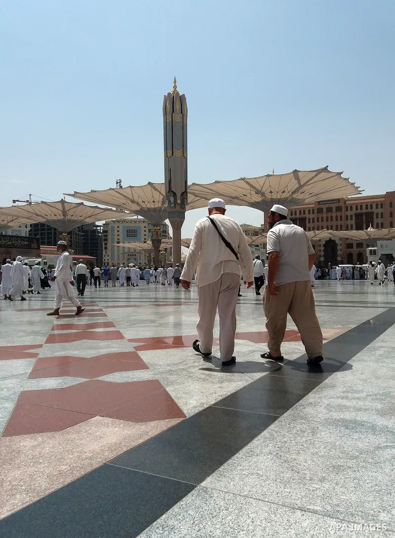 Muslims pilgrims visit the tomb of Prophet Mohammad at Al-Masjid al-Nabawi (The Mosque of the Prophet) after their duty of pilgrimage in the holy city of Medina, Saudi Arabia Sept. 11, 2017. Photo by Mohammed Hassan