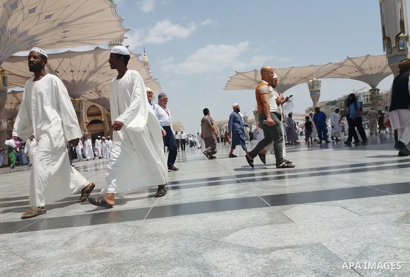 Muslims pilgrims visit the tomb of Prophet Mohammad at Al-Masjid al-Nabawi (The Mosque of the Prophet) after their duty of pilgrimage in the holy city of Medina, Saudi Arabia Sept. 11, 2017. Photo by Mohammed Hassan