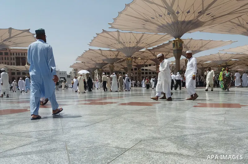 Muslims pilgrims visit the tomb of Prophet Mohammad at Al-Masjid al-Nabawi (The Mosque of the Prophet) after their duty of pilgrimage in the holy city of Medina, Saudi Arabia Sept. 11, 2017. Photo by Mohammed Hassan