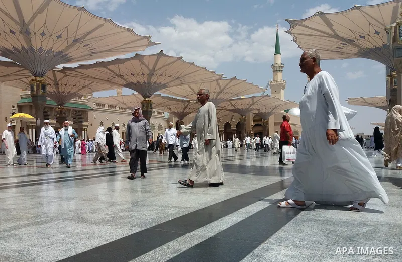 Muslims pilgrims visit the tomb of Prophet Mohammad at Al-Masjid al-Nabawi (The Mosque of the Prophet) after their duty of pilgrimage in the holy city of Medina, Saudi Arabia Sept. 11, 2017. Photo by Mohammed Hassan