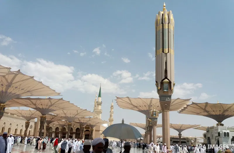 Muslims pilgrims visit the tomb of Prophet Mohammad at Al-Masjid al-Nabawi (The Mosque of the Prophet) after their duty of pilgrimage in the holy city of Medina, Saudi Arabia Sept. 11, 2017. Photo by Mohammed Hassan