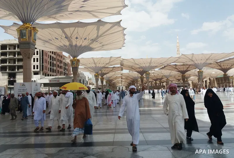 Muslims pilgrims visit the tomb of Prophet Mohammad at Al-Masjid al-Nabawi (The Mosque of the Prophet) after their duty of pilgrimage in the holy city of Medina, Saudi Arabia Sept. 11, 2017. Photo by Mohammed Hassan