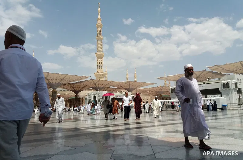 Muslims pilgrims visit the tomb of Prophet Mohammad at Al-Masjid al-Nabawi (The Mosque of the Prophet) after their duty of pilgrimage in the holy city of Medina, Saudi Arabia Sept. 11, 2017. Photo by Mohammed Hassan