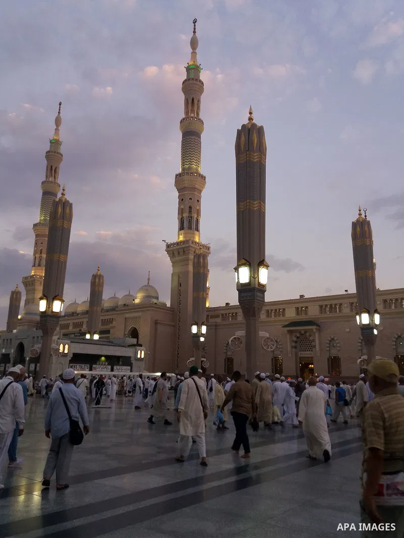 Muslims pilgrims visit the tomb of Prophet Mohammad at Al-Masjid al-Nabawi (The Mosque of the Prophet) after their duty of pilgrimage in the holy city of Medina, Saudi Arabia Sept. 11, 2017. Photo by Mohammed Hassan
