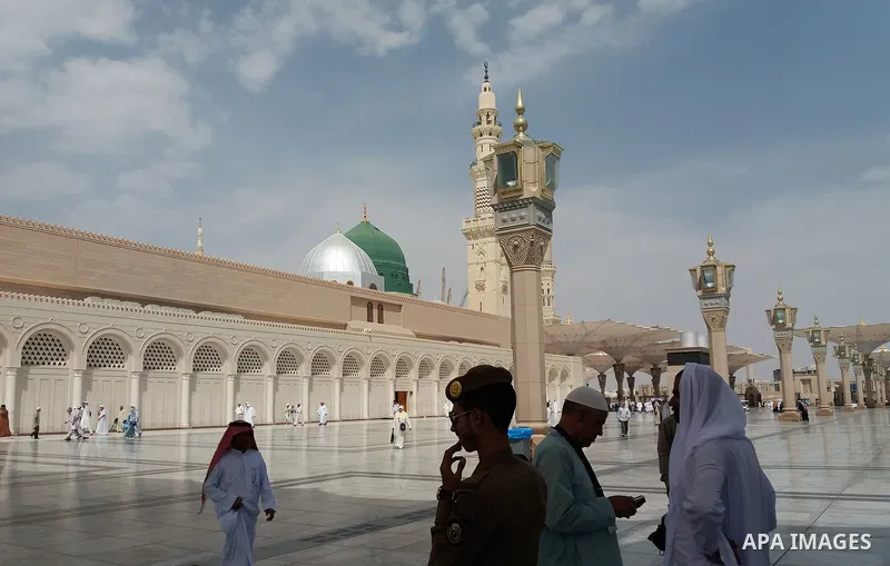 Muslims pilgrims visit the tomb of Prophet Mohammad at Al-Masjid al-Nabawi (The Mosque of the Prophet) after their duty of pilgrimage in the holy city of Medina, Saudi Arabia Sept. 11, 2017. Photo by Mohammed Hassan