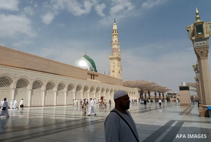 Muslims pilgrims visit the tomb of Prophet Mohammad at Al-Masjid al-Nabawi (The Mosque of the Prophet) after their duty of pilgrimage in the holy city of Medina, Saudi Arabia Sept. 11, 2017. Photo by Mohammed Hassan