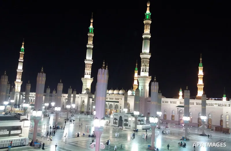 Muslims pilgrims visit the tomb of Prophet Mohammad at Al-Masjid al-Nabawi (The Mosque of the Prophet) after their duty of pilgrimage in the holy city of Medina, Saudi Arabia Sept. 11, 2017. Photo by Mohammed Hassan