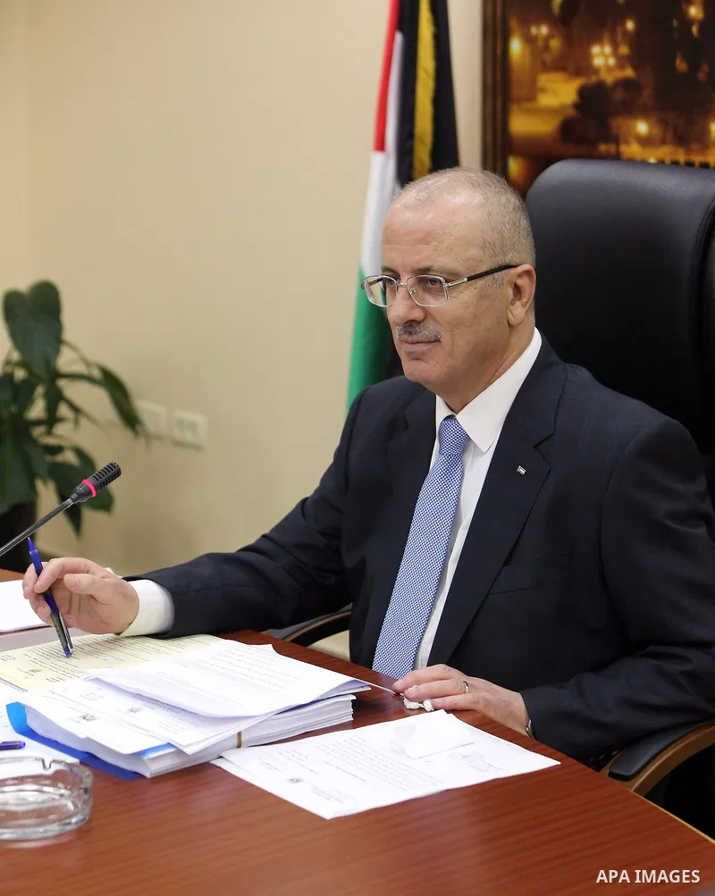 Palestinian Prime Minister, Rami hamdallah, chairs the Palestinian council meeting in the West Bank city of Ramallah on September 12, 2017. Photo by Prime Minister Office