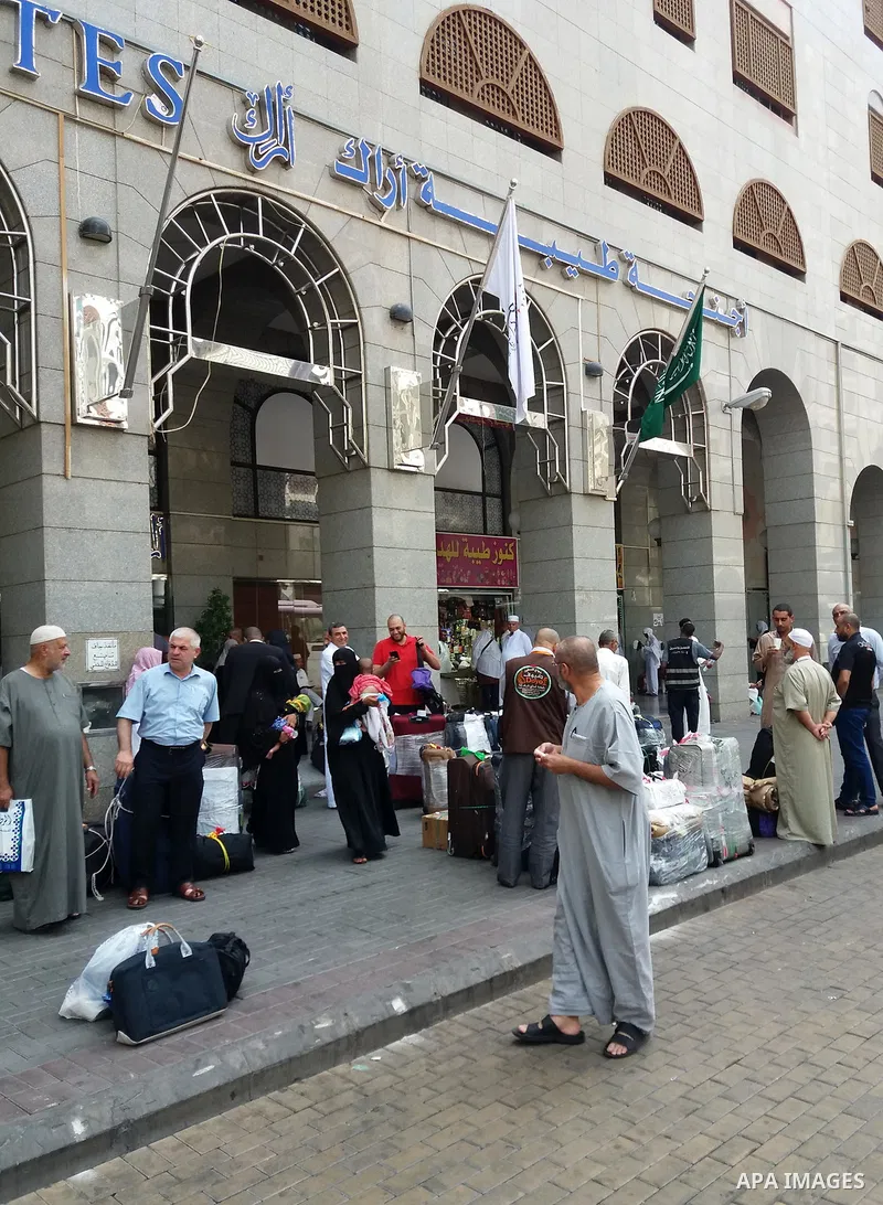 Muslim pilgrims load their bags after perform the annual hajj pilgrimage in the holy city of Mecca on Sept. 12, 2017. Photo by Mohammed Hassan
