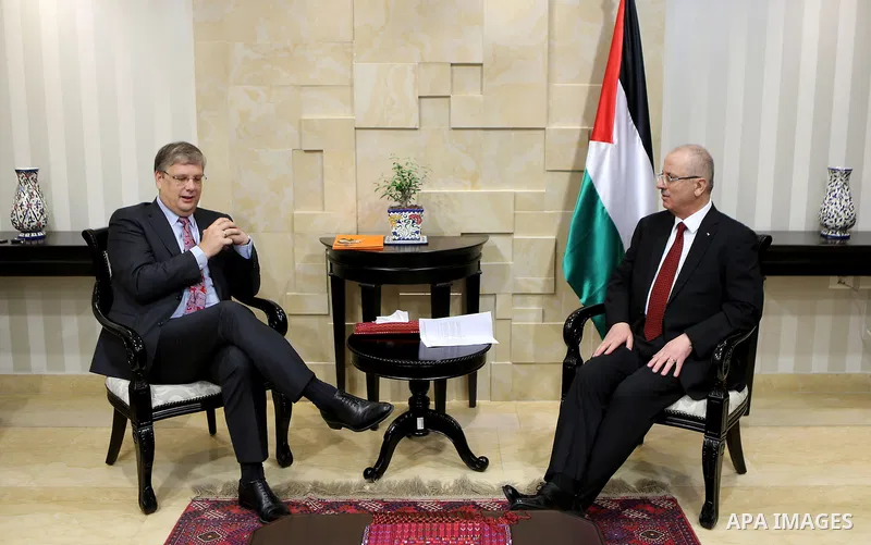 Palestinian Prime Minister, Rami Hamdallah, meets with representative of the Netherlands to Palestine Peter Moulima, in the West Bank city of Ramallah, on Sept. 14. 2017. Photo by Prime Minister Office