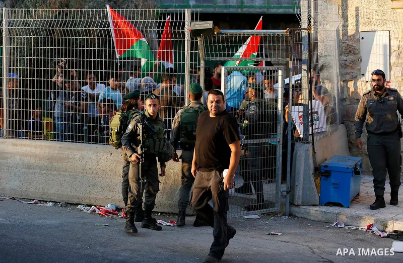 Israeli security forces stand guard during a demonstration by Palestinians in the West Bank city of Hebron on September 18, 2017. Israel has given Jewish settlement enclaves in the occupied West Bank city of Hebron the a...