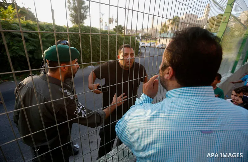 Palestinian protester argues with a Jewish settler during a demonstration in the West Bank city of Hebron on September 18, 2017. Israel has given Jewish settlement enclaves in the occupied West Bank city of Hebron the au...