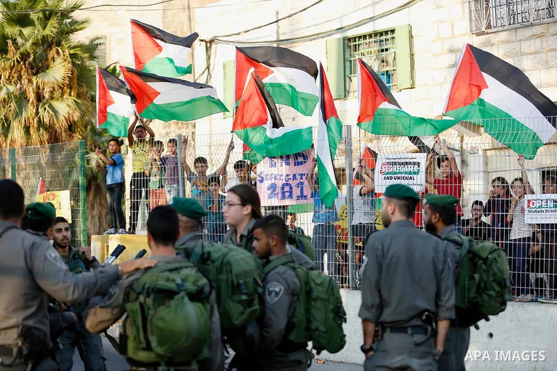 Israeli security forces stand guard during a demonstration by Palestinians in the West Bank city of Hebron on September 18, 2017. Israel has given Jewish settlement enclaves in the occupied West Bank city of Hebron the a...