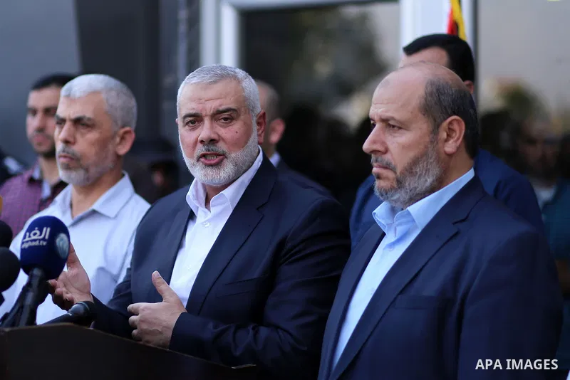Hamas Chief Ismail Haniyeh speaks to the press upon his arrival on the Palestinian side of the Rafah border crossing, in the southern Gaza Strip on September 19, 2017. Haniyeh said on Tuesday evening that his movement is...