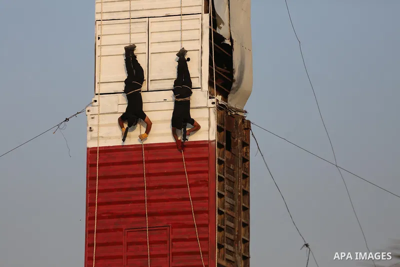 Palestinian militants of al-Nasser Salah al-Deen Brigades, the military wing of the Popular Resistance Committees, take part in a training exercise in Khan Younis in the southern Gaza Strip on September 19, 2017. Photo b...
