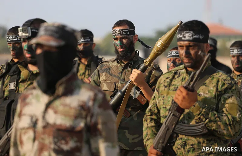 Palestinian militants of al-Nasser Salah al-Deen Brigades, the military wing of the Popular Resistance Committees, take part in a training exercise in Khan Younis in the southern Gaza Strip on September 19, 2017. Photo b...
