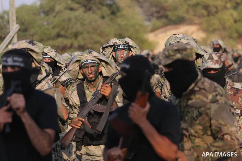 Palestinian militants of al-Nasser Salah al-Deen Brigades, the military wing of the Popular Resistance Committees, take part in a training exercise in Khan Younis in the southern Gaza Strip on September 19, 2017. Photo b...