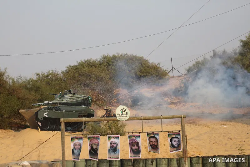 Palestinian militants of al-Nasser Salah al-Deen Brigades, the military wing of the Popular Resistance Committees, take part in a training exercise in Khan Younis in the southern Gaza Strip on September 19, 2017. Photo b...
