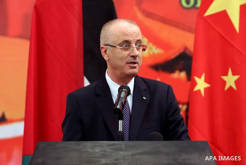 Palestinian Prime Minister Rami Hamdallah take part during the ceremony of the sixty-eighth anniversary of the founding of the People's Republic of China, in the West Bank city of Ramallah on September 20, 2017. Photo by...