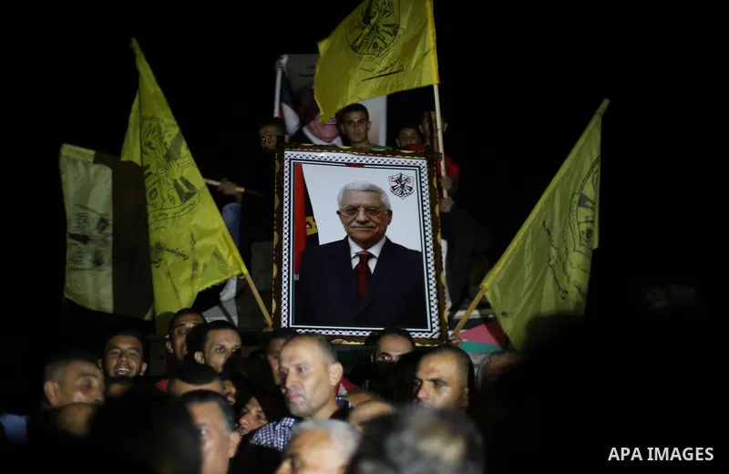 Palestinian supporters of Fateh movement and Palestinian president Mahmud Abbas (portrait) gather in Gaza City as Abbas addresses the 72nd United Nations General Assembly at the United Nations headquarters in New York on...