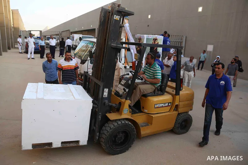 Egyptian workers transport statues upon its arrival at the restoration laboratory of the Grand Egyptian Museum (GEM) in Cairo, Egypt, on Sept. 20, 2017. A batch of statues were transported from the Egyptian Museum to the...