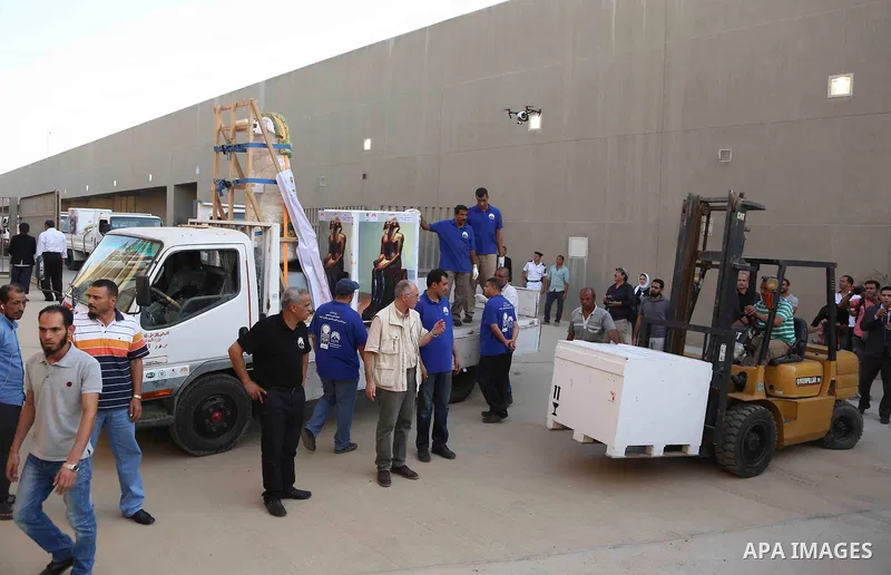 Egyptian workers transport statues upon its arrival at the restoration laboratory of the Grand Egyptian Museum (GEM) in Cairo, Egypt, on Sept. 20, 2017. A batch of statues were transported from the Egyptian Museum to the...