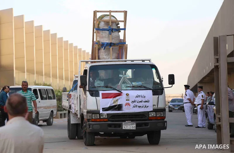 Egyptian workers transport statues upon its arrival at the restoration laboratory of the Grand Egyptian Museum (GEM) in Cairo, Egypt, on Sept. 20, 2017. A batch of statues were transported from the Egyptian Museum to the...