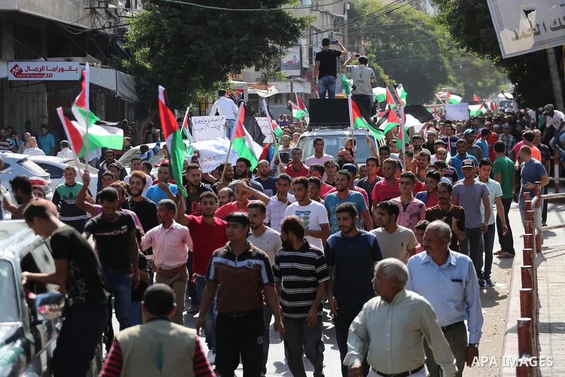 Palestinians of the Union of Agricultural Work Committees take part in a support of the Palestinian reconciliation, in Gaza city, on September 24, 2017. Palestinian President Mahmoud Abbas on Saturday said an announcemen...