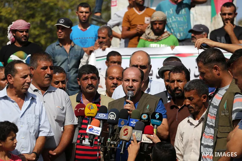 Palestinians of the Union of Agricultural Work Committees take part in a support of the Palestinian reconciliation, in Gaza city, on September 24, 2017. Palestinian President Mahmoud Abbas on Saturday said an announcemen...