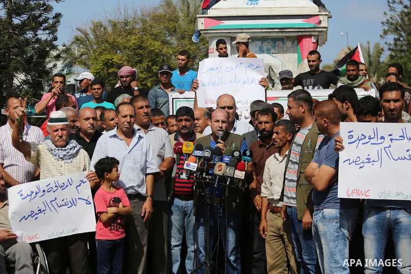 Palestinians of the Union of Agricultural Work Committees take part in a support of the Palestinian reconciliation, in Gaza city, on September 24, 2017. Palestinian President Mahmoud Abbas on Saturday said an announcemen...