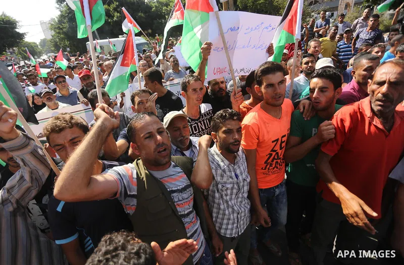 Palestinians of the Union of Agricultural Work Committees take part in a support of the Palestinian reconciliation, in Gaza city, on September 24, 2017. Palestinian President Mahmoud Abbas on Saturday said an announcemen...